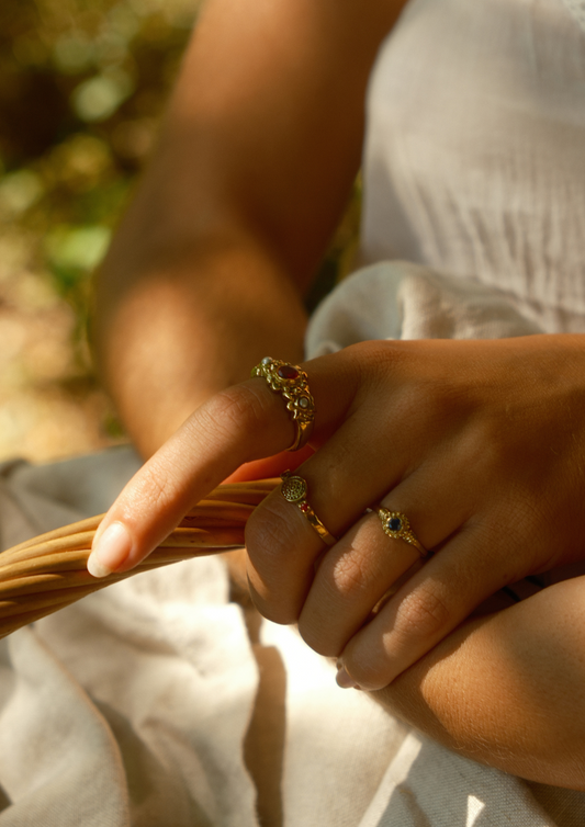 Brass pattern garnet stone ring