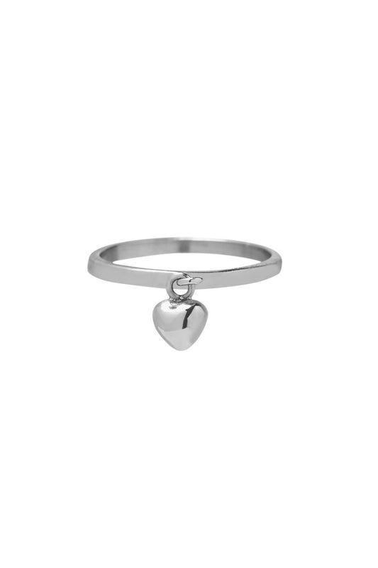 Silver hammered ring with heart pendant