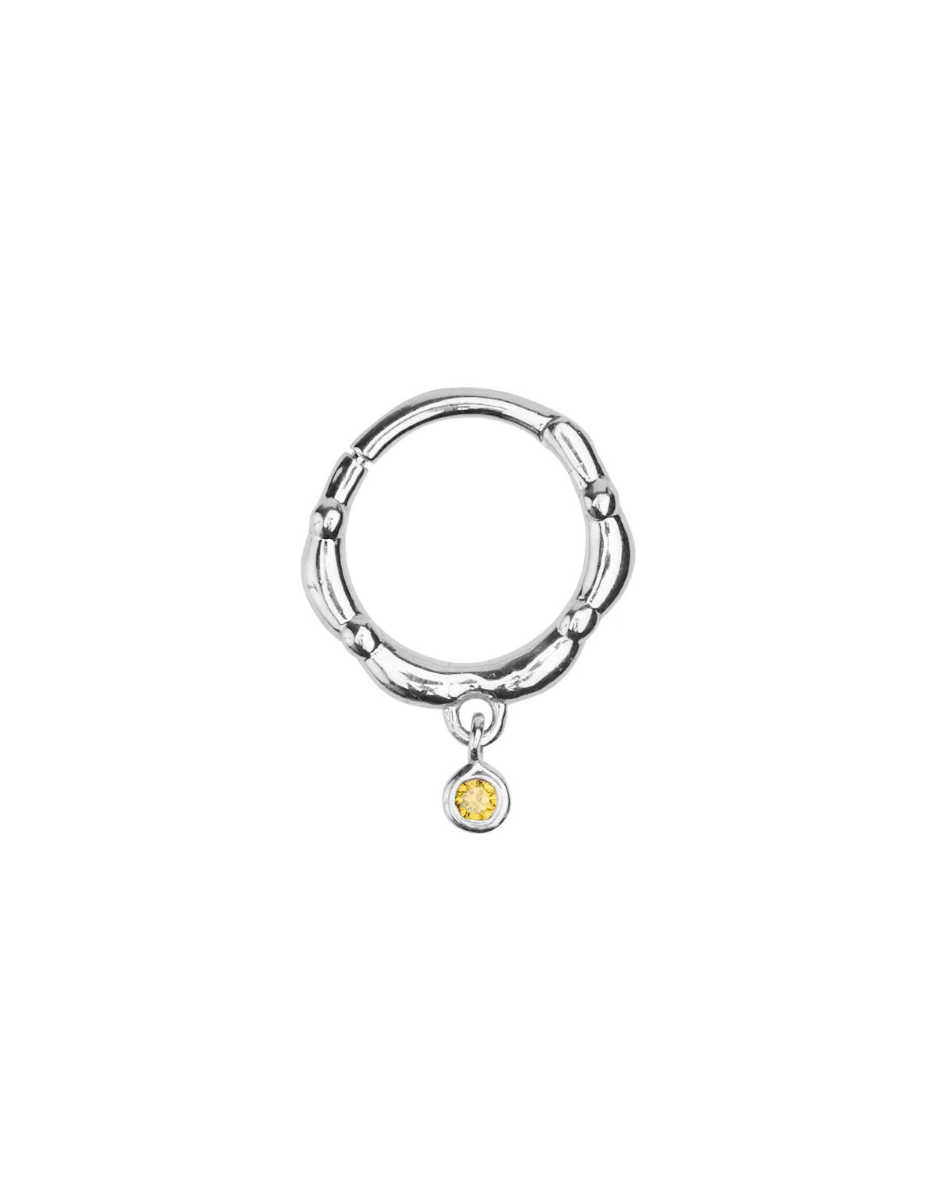 Silver piercing peridot stone